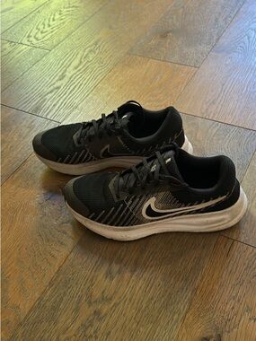 Nike Men’s Run Defy Black and White Athletic Running Shoes